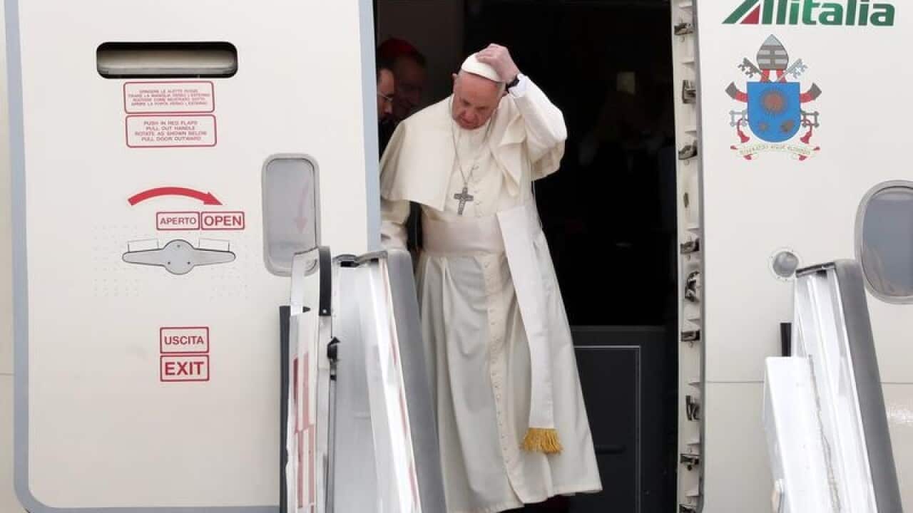Pope Francis gets off his plane in Chile