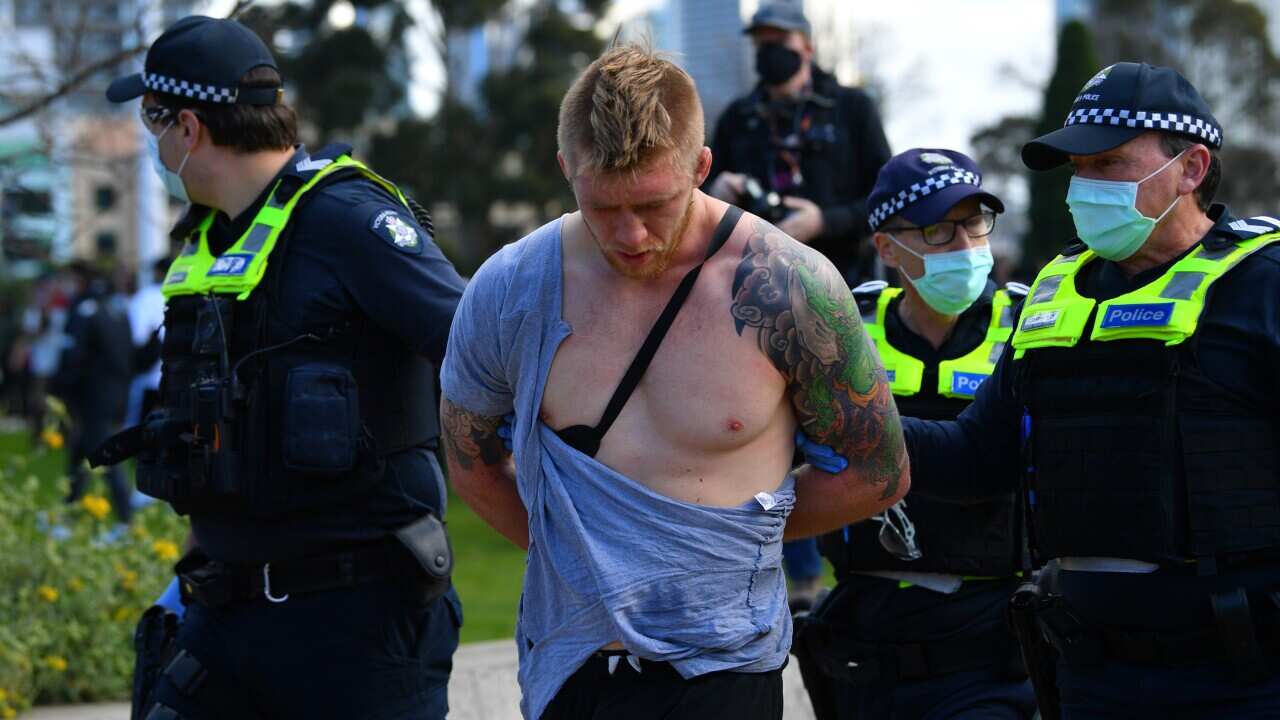 Protesters are seen at the Shrine of Remembrance in Melbourne, Saturday, September 5, 2020. Anti lockdown protests are planned at various locations in Melbourne CBD, including the Shrine of Remembrance.