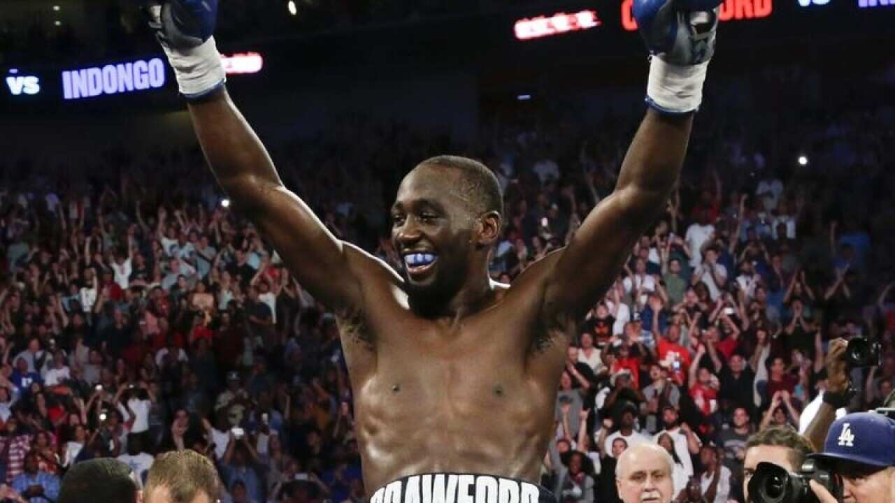 Terence "Bud" Crawford celebrates his victory.