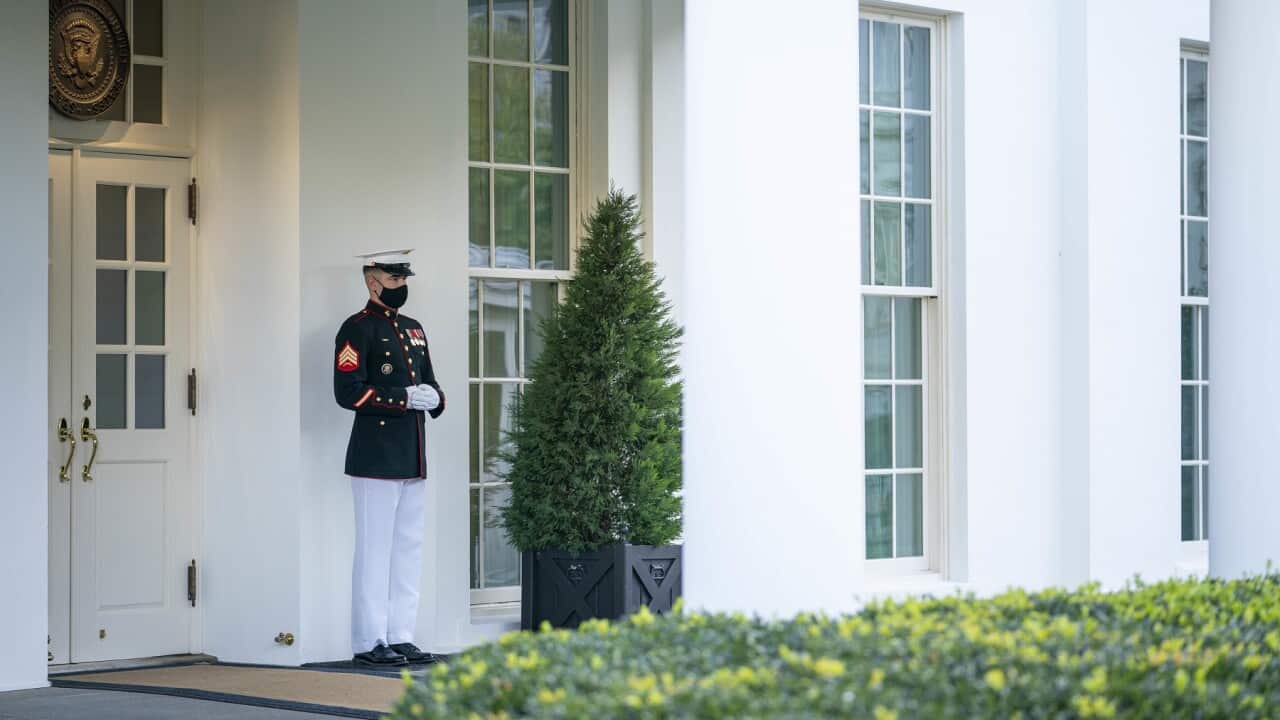 A Marine on duty outside the Oval Office where US President Donald Trump is reportedly being briefed