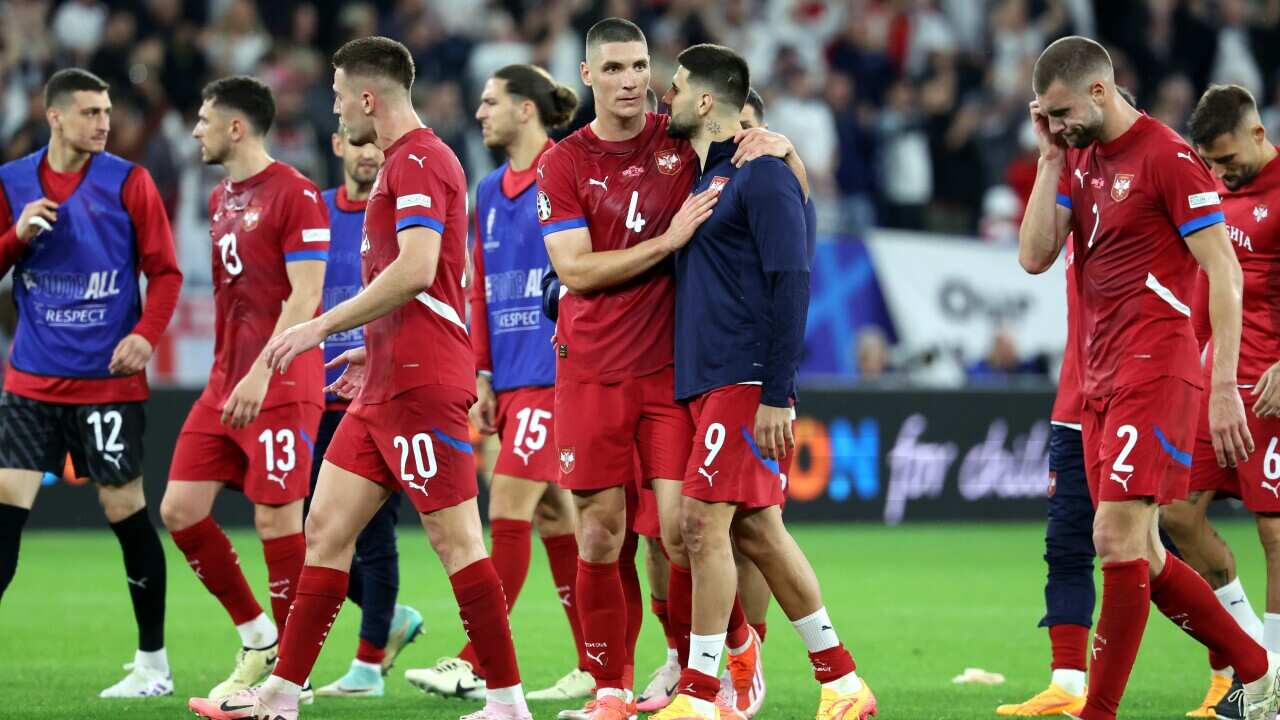 Players of Serbia react after losing the UEFA EURO 2024 group C match against England in Gelsenkirchen,