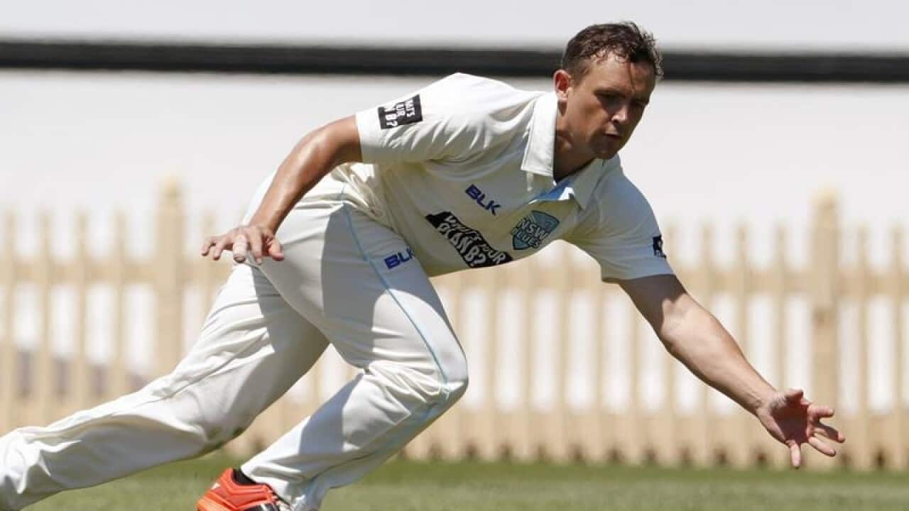 A file image of Steve O'Keefe catching a ball during a match.