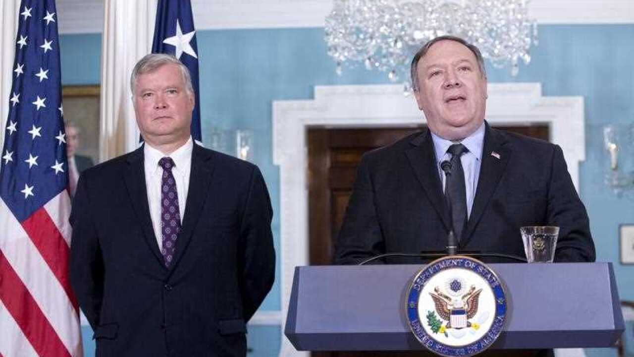 US Secretary of State Mike Pompeo (R) announces former senior executive of Ford Motor Company Stephen Biegun (L) to be special envoy for North Korea,