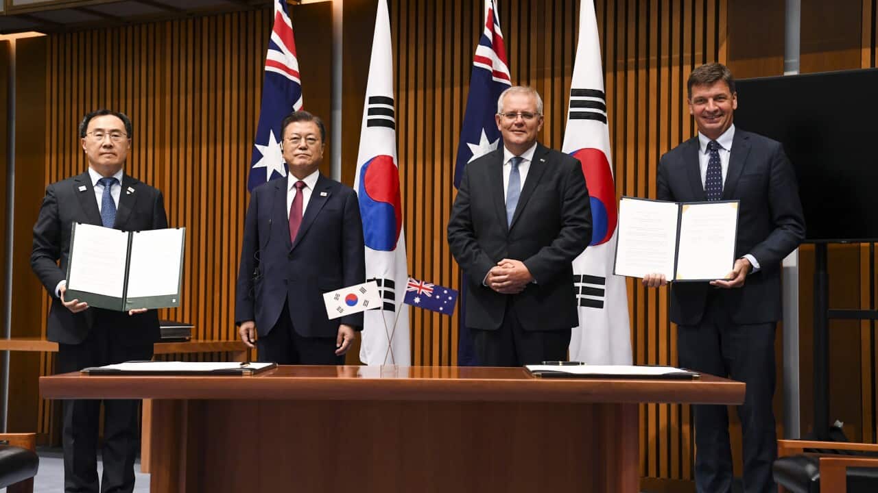 Prime Minister Scott Morrison (centre right) and South Korean President Moon Jae-in (centre left) with South Korean Trade Minister Yeo Han-koo and Energy Minister Angus Taylor