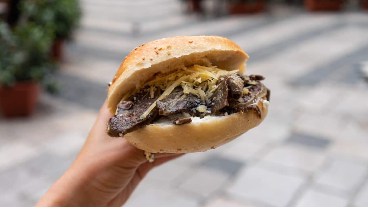 A close up of pani ca meusa, a sandwich with veal spleen.