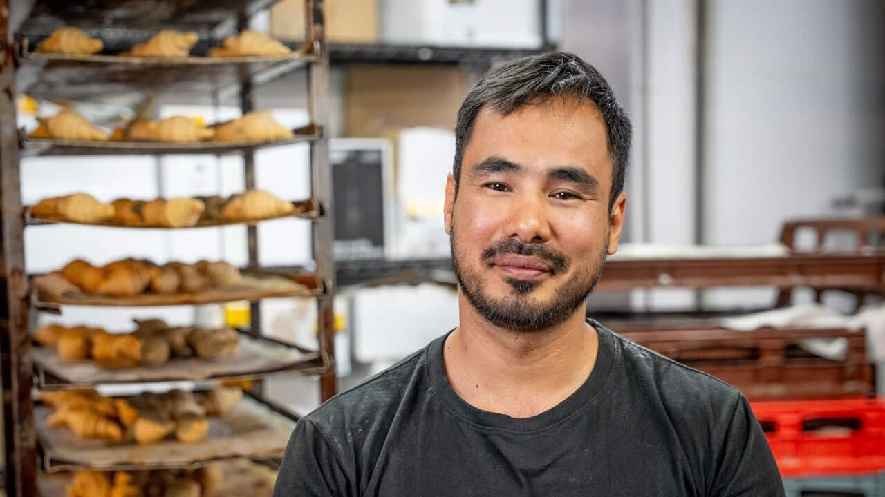 Ben is busy learning on the job at a Sydney bakery (SBS).jpg
