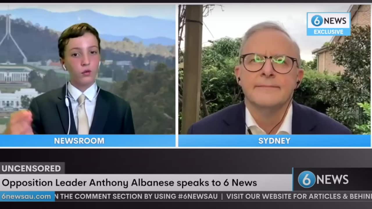 Federal political reporter for 6 News Roman Mackinnon with Opposition leader Anthony Albanese.