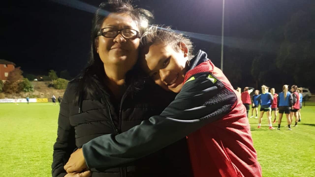 Rising football star Susan Phonsongkham and her mother Narumol Sultana