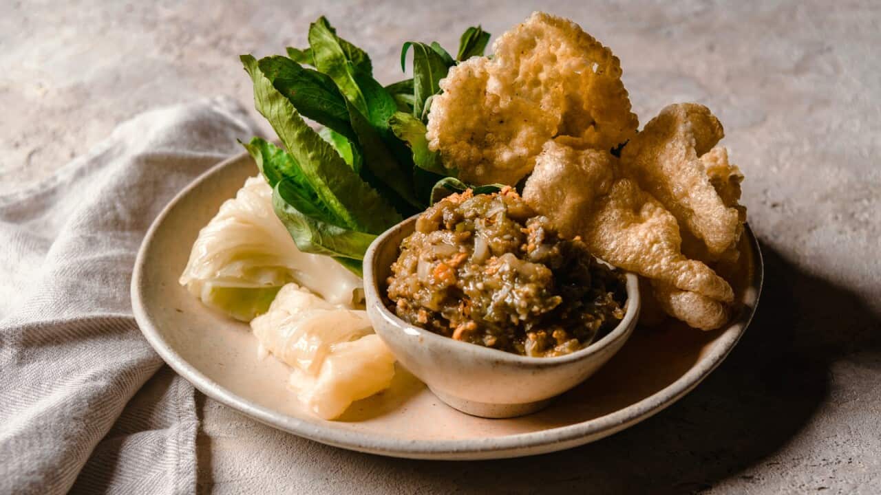 Grilled long eggplant and chilli relish with crispy pork skin