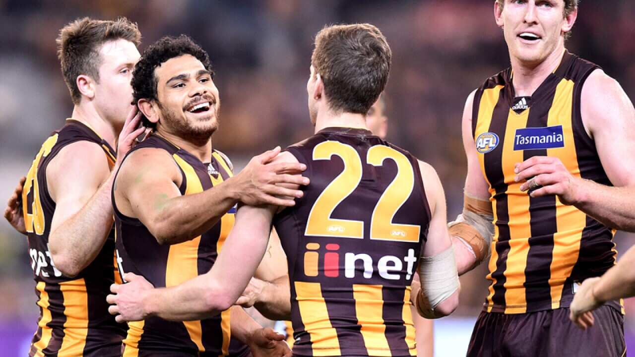 The Hawks celebrate.