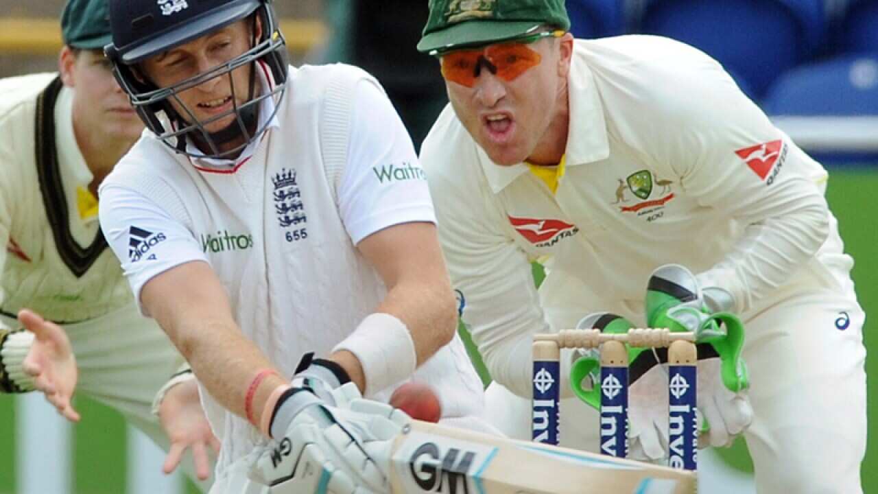 England’s Joe Root and Australia’s wicket keeper Brad Haddin