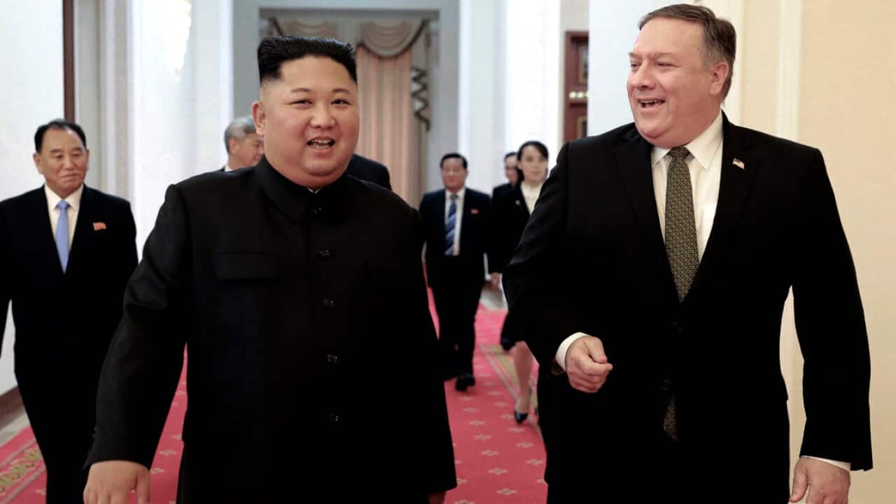 In this Oct. 7, 2018, file photo provided by the North Korean government, North Korean leader Kim Jong Un, center left, and U.S. Secretary of State Mike Pompeo walk together (AAP)