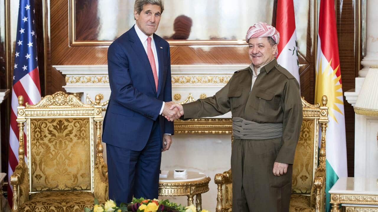 Kurdistan regional government president Massud Barzani (R) greets US Secretary of State John Kerry (AFP Photo)