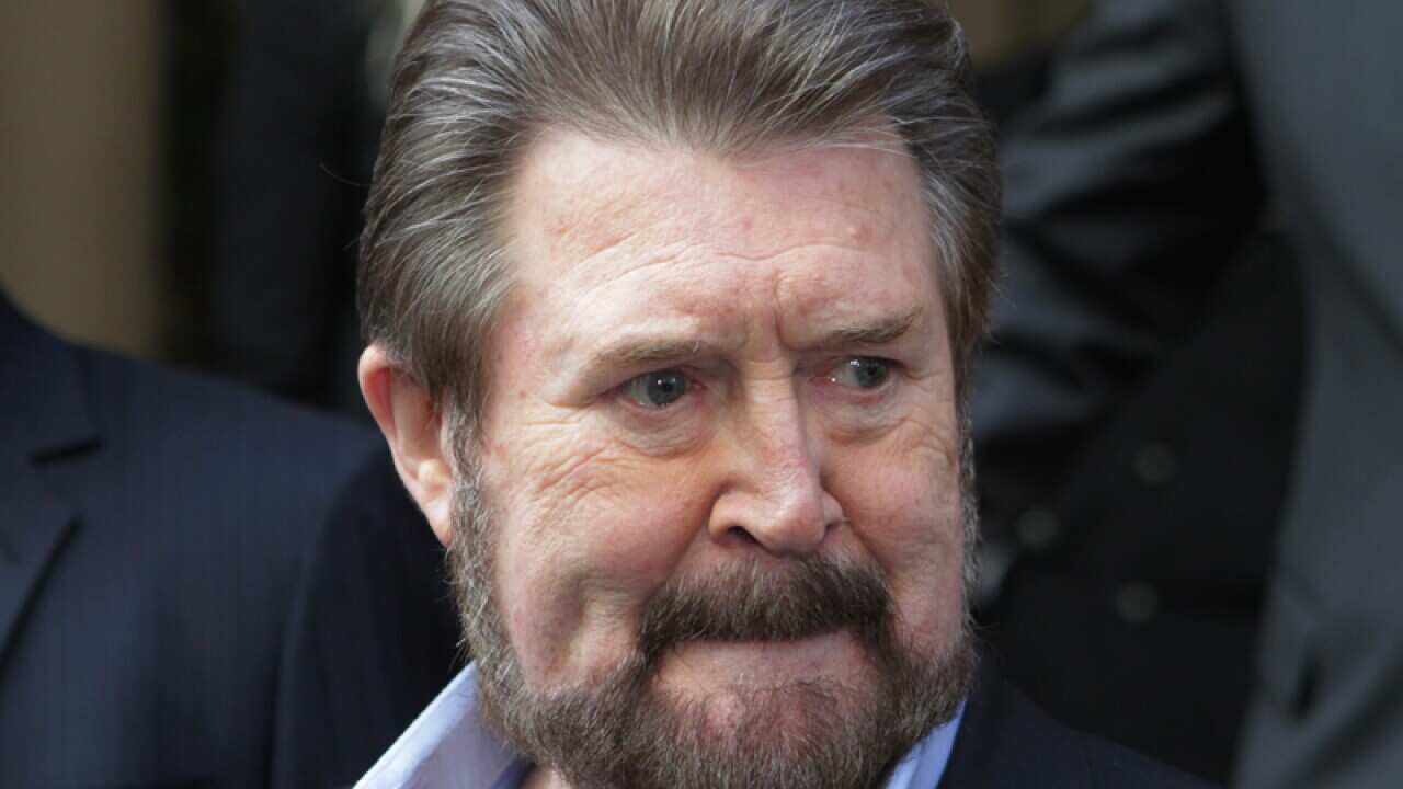 Derryn Hinch outside court