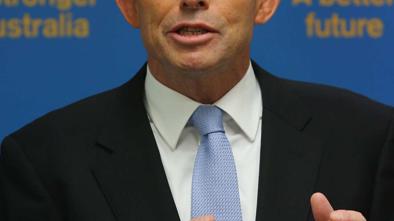 Abbott speaking.jpg