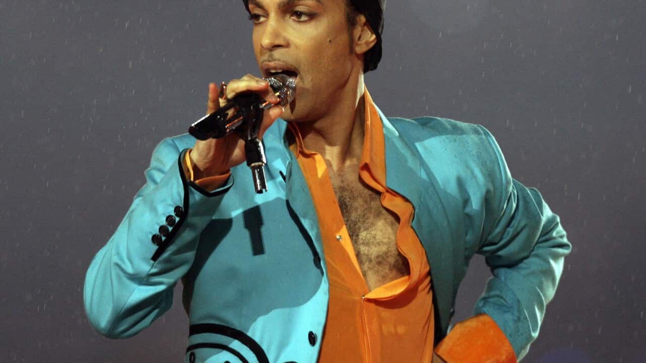 Prince performs during the halftime show at Super Bowl XLI at Dolphin Stadium in Miami, Sunday, Feb. 4, 2007. (AP Photo/Alex Brandon)