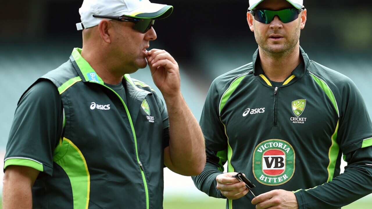 Cricket coach Darren Lehmann (L) and captain Michael Clarke
