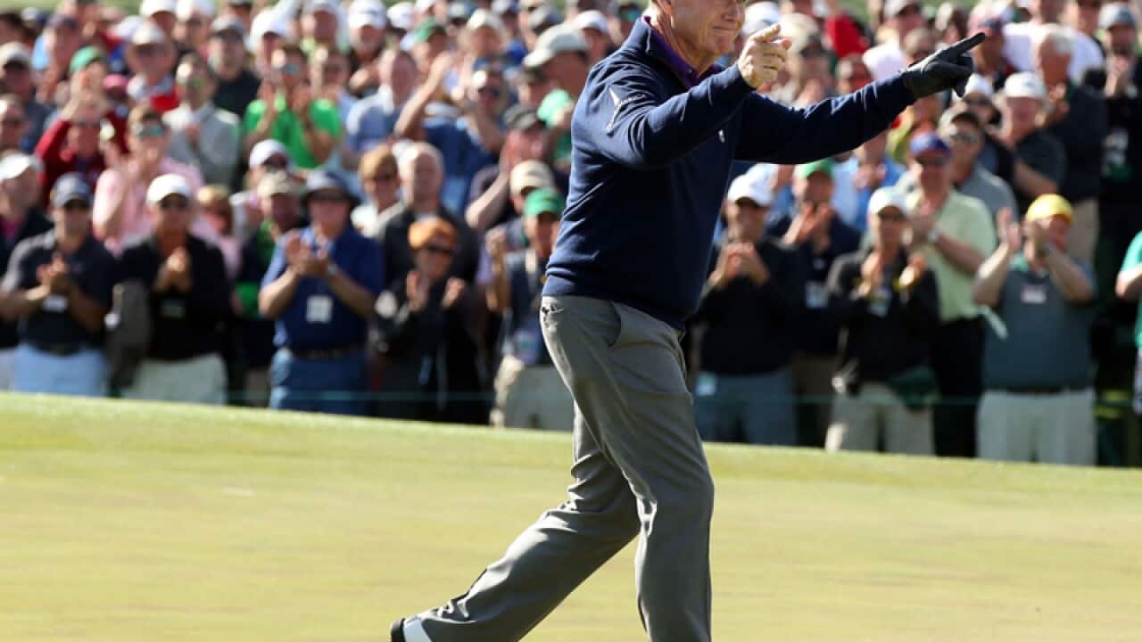 Tom Watson salutes the gallery