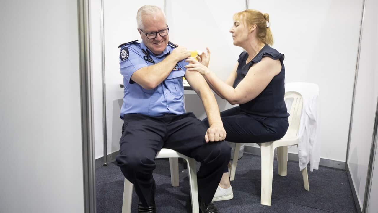 WA Police Commissioner Chris Dawson receives the vaccine in Perth