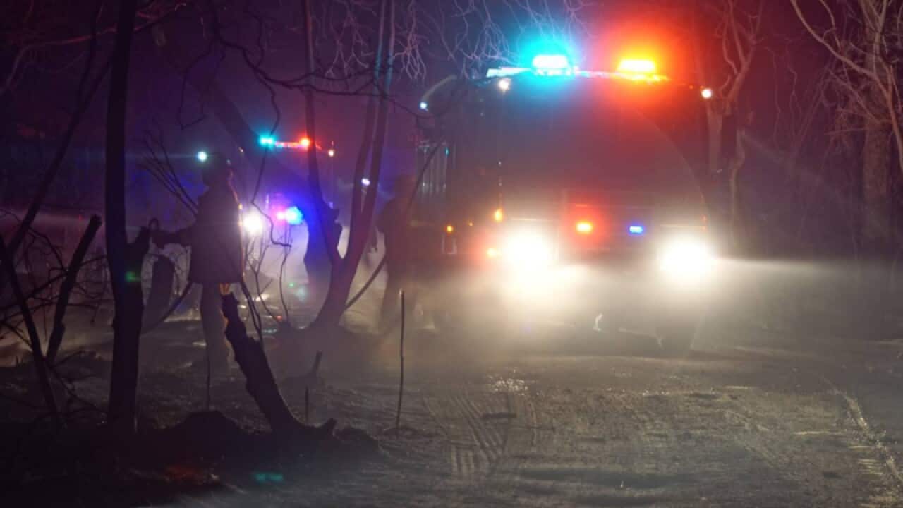 Firefighters battle a blaze at Crib Point, Victoria