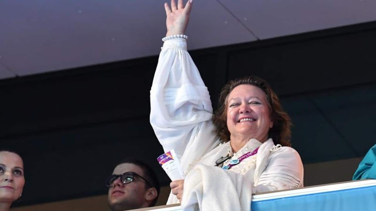 Gina Reinhart waves to the crowd during the XXI Commonwealth Games.
