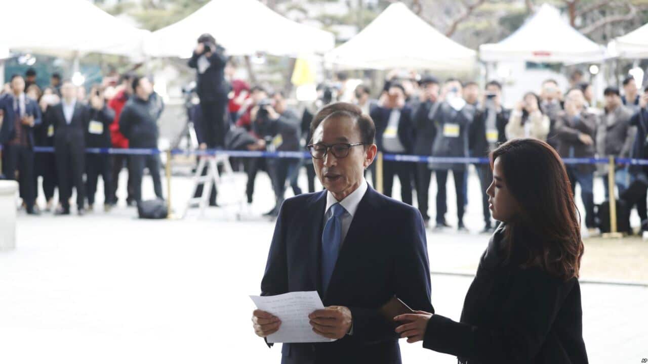Former South Korean President Lee Myung-bak speaks upon arrival for questioning over bribery allegations at the Seoul Central District Prosecutors' Office in Seoul, South Korea, March 14, 2018.
