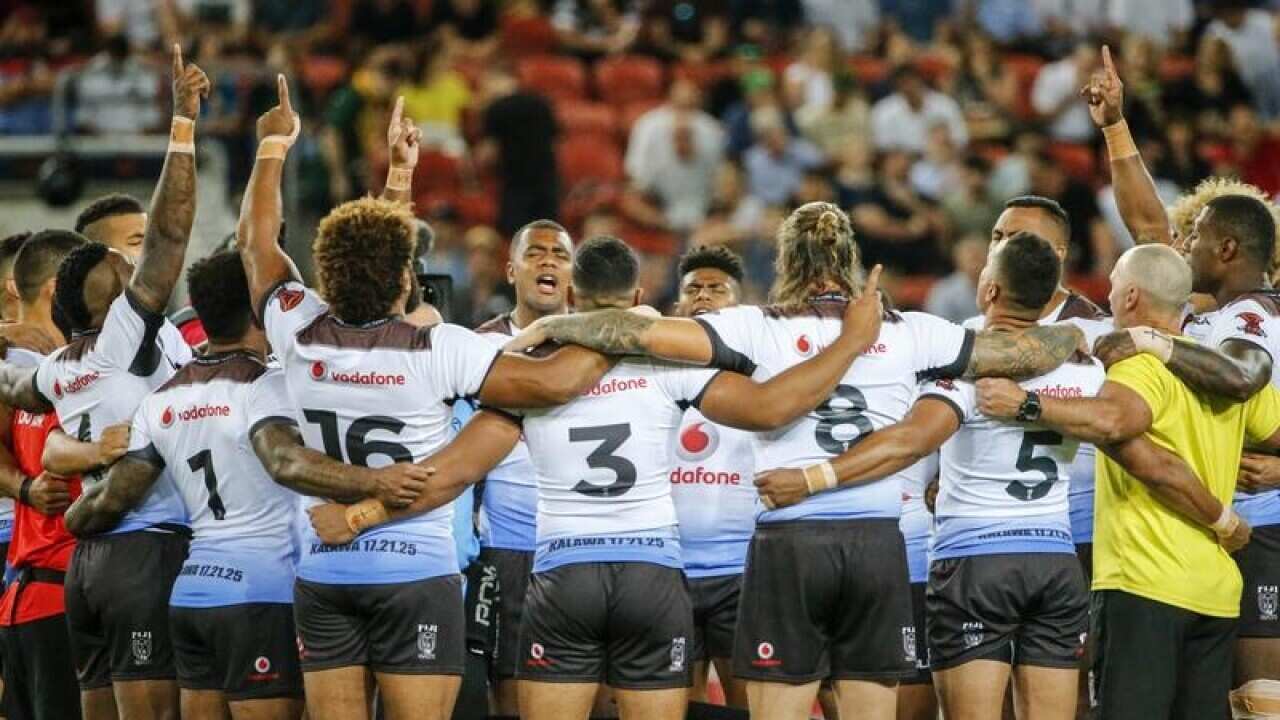 Fiji Bati sing a hyme before the game during the RLWC semi-final.