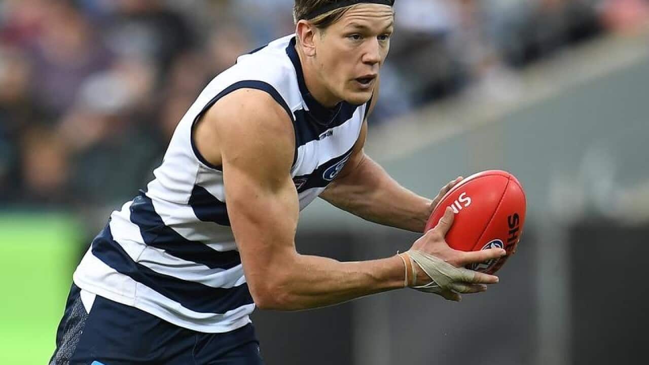 File image of Rhys Stanley of the Cats is in action.