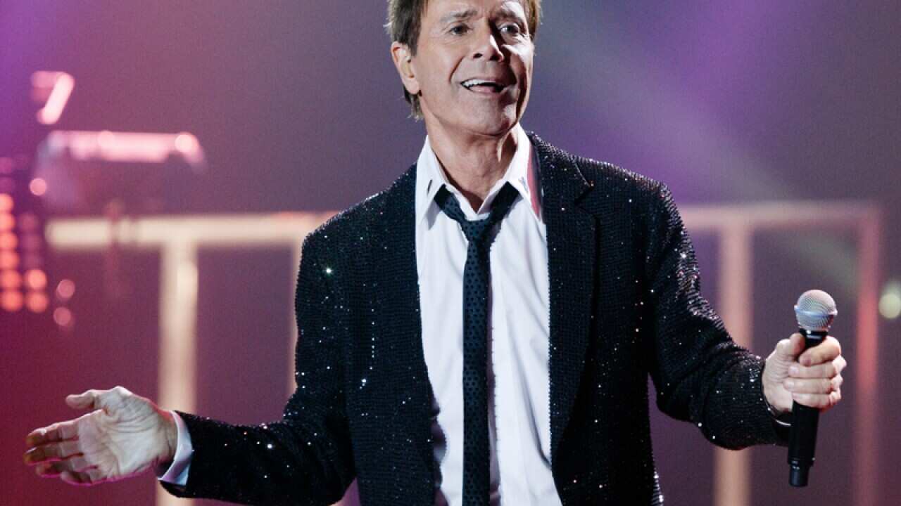 Cliff Richard performs.