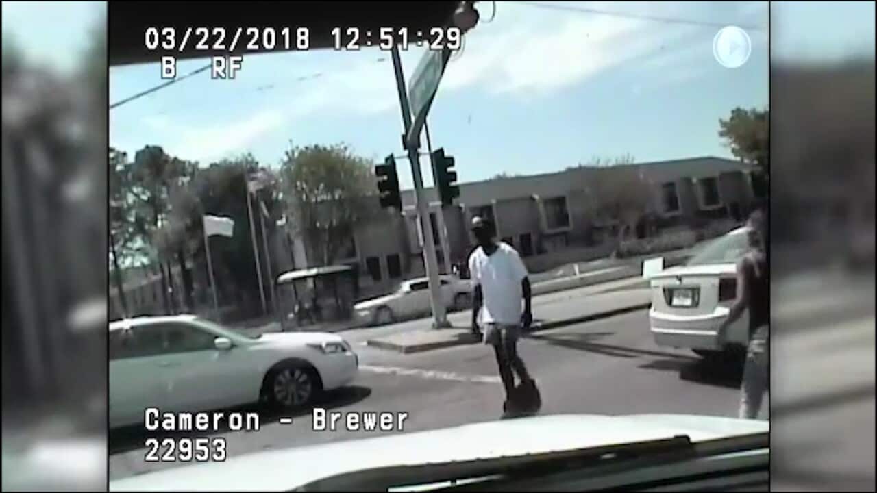 The unarmed man moments before he was shot.