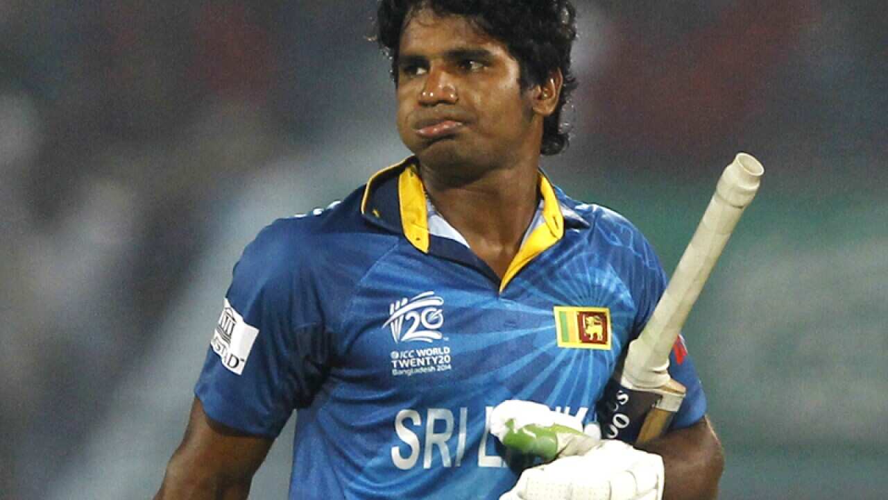 Sri Lanka's Kusal Perera walks back to the pavilion in Chittagong