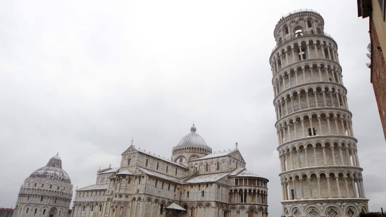 The Leaning Tower of Pisa is next to the medieval cathedral of Pisa in Piazza dei Miracoli Square