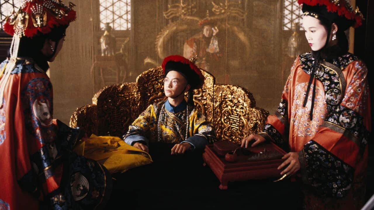 Chinese actors Wu Tao and Joan Chen (R)on the set of The Last Emperor, directed by Bernardo Bertolucci , 1987.