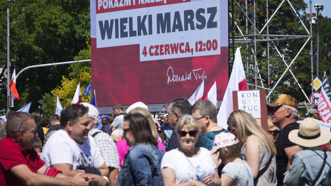 Hundreds of thousands march in support of opposition in Poland