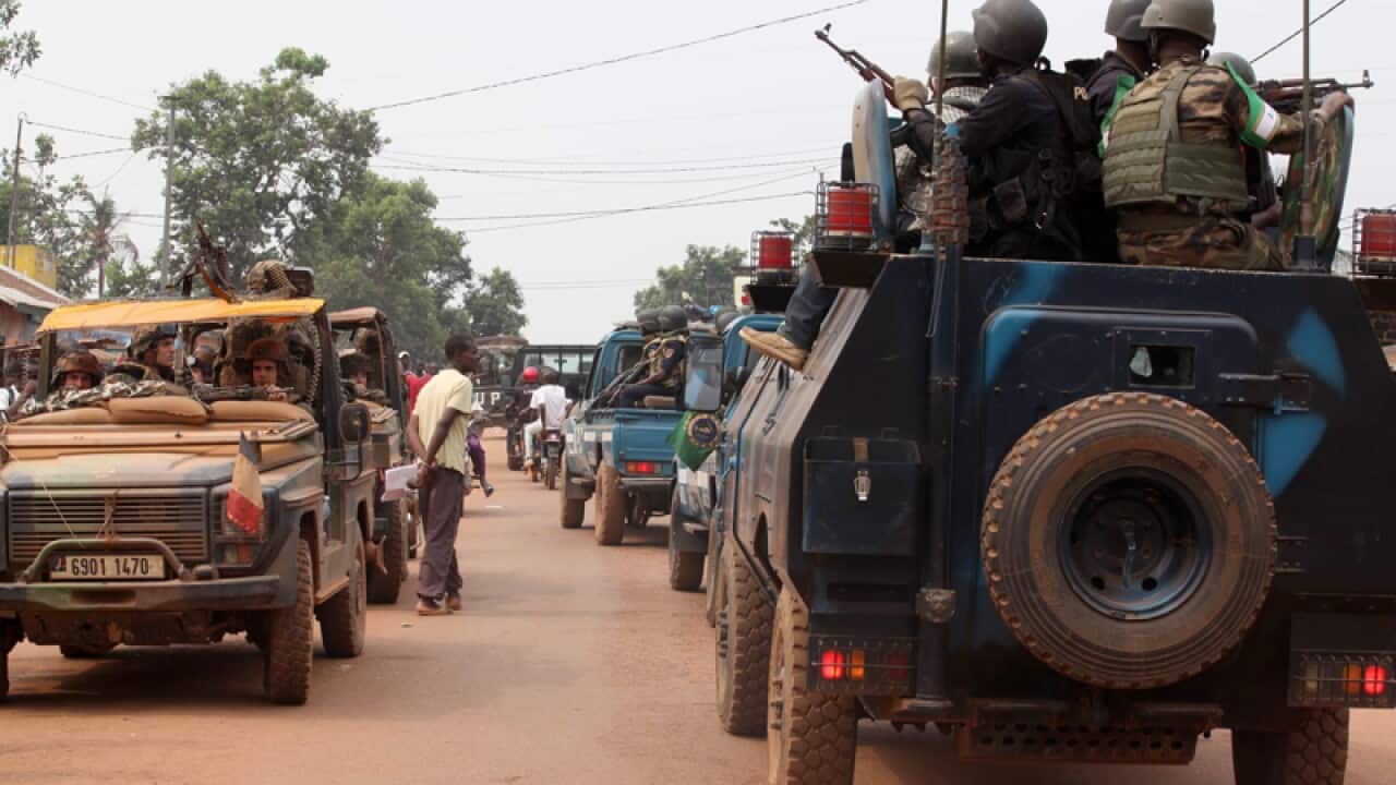 Peacekeeping troops lead a disarmament operation in Bangui