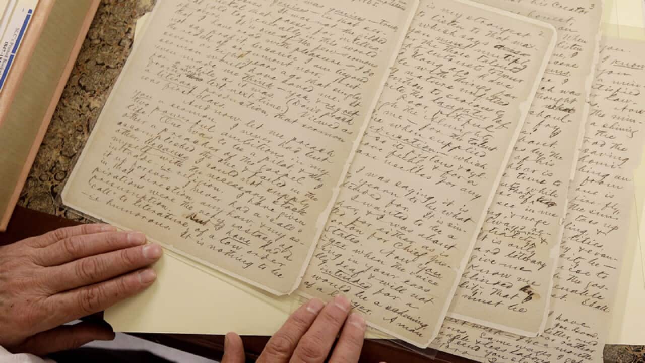 Bob Hirst, general editor of the Mark Twain Project, shows a letter.