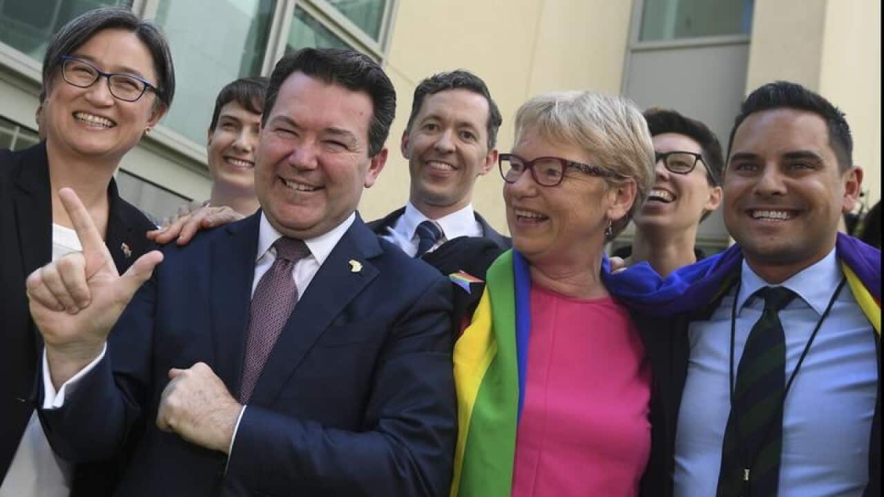 Senator Dean Smith celebrates.