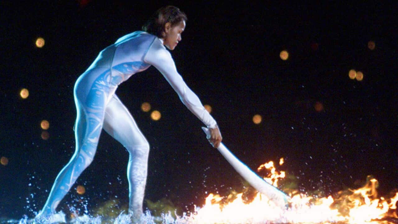 Cathy Freeman ignites the Olympic flame at Olympic Stadium