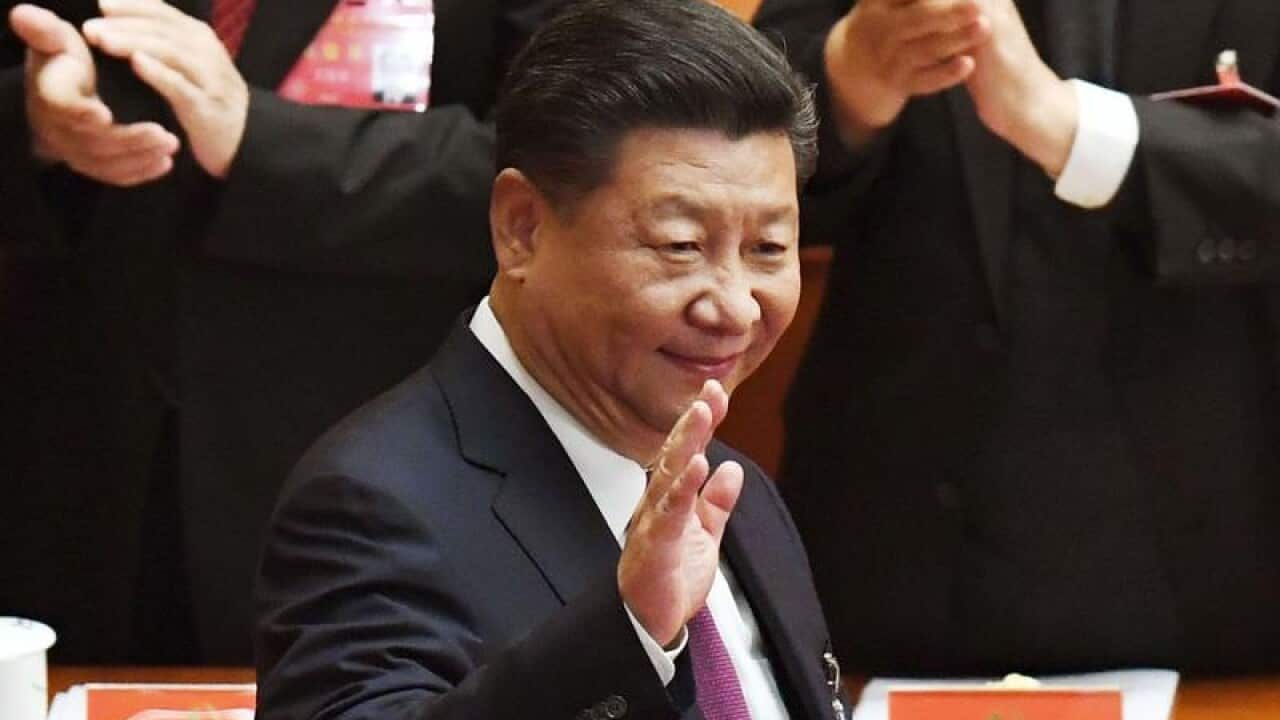Chinese President Xi Jinping waves