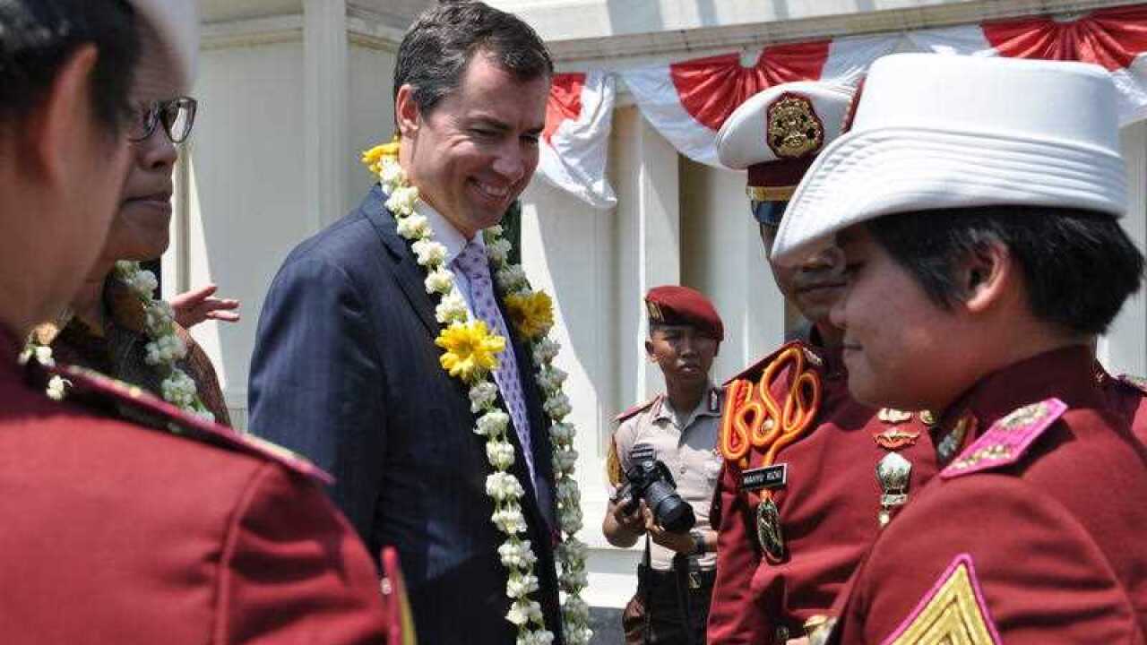 Justice Minister Michael Keenan is greeted at the Jakarta Centre for Law Enforcement Cooperation at Semarang, Central Java, Indonesia, Wednesday, Aug. 20, 2014. (File: AAP Image/Gabrielle Dunlevy)