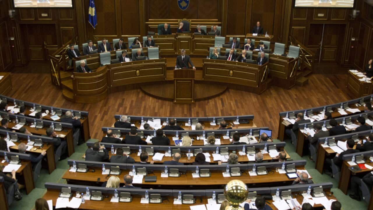 Kosovo's prime minister addresses lawmakers during parliament