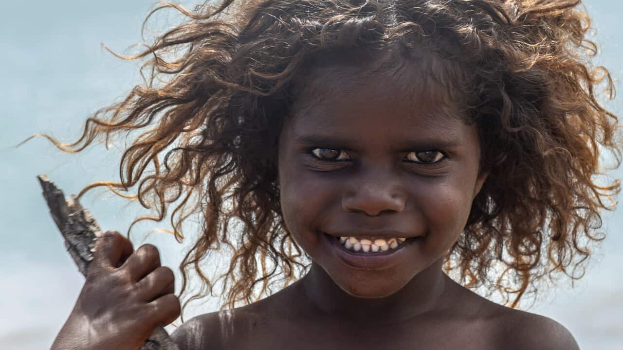 Portrait of a Young Indigenous girl with curly hair
