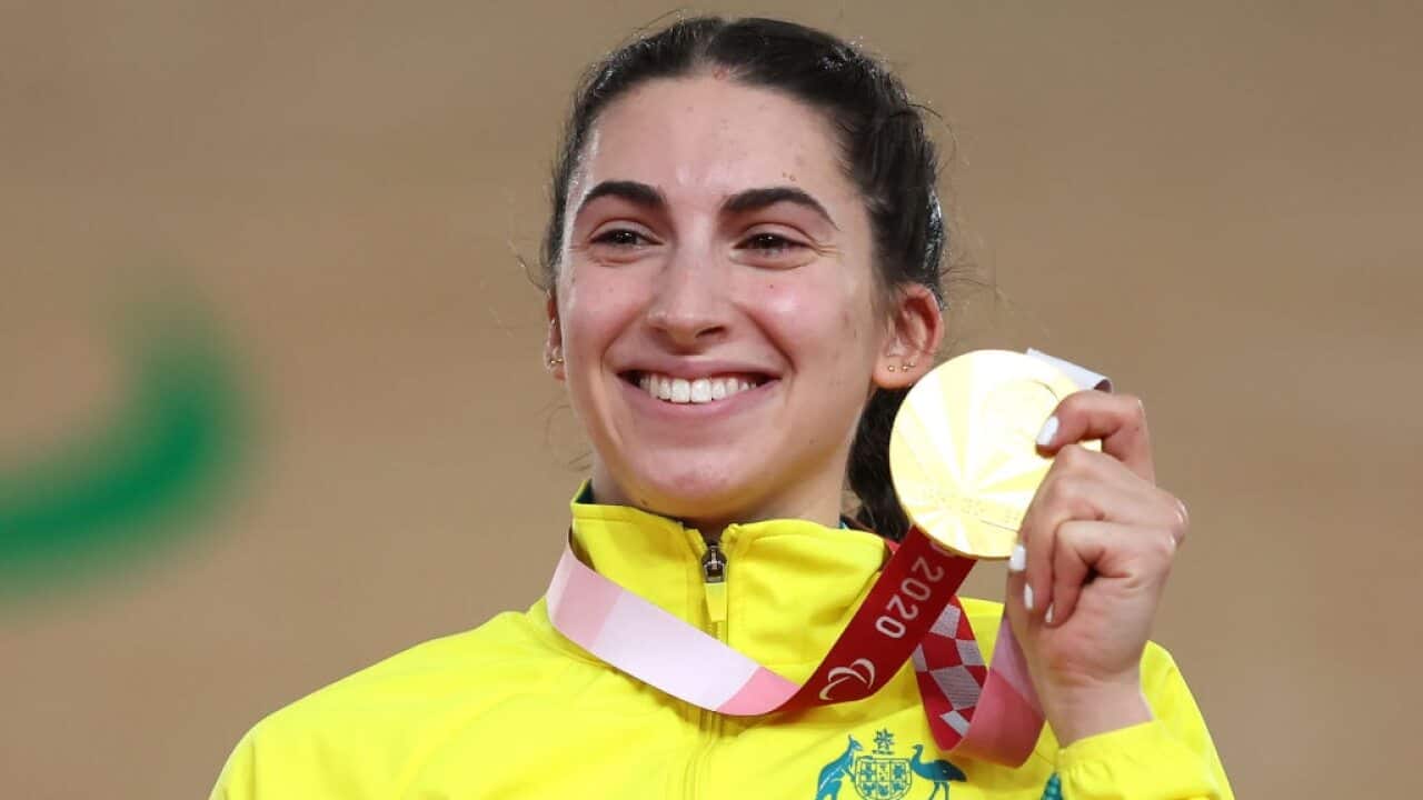 Gold medalist Paige Greco of Team Australia poses during the medal ceremony for Track Cycling Womens C1-3 3000m Individual Pursuit.