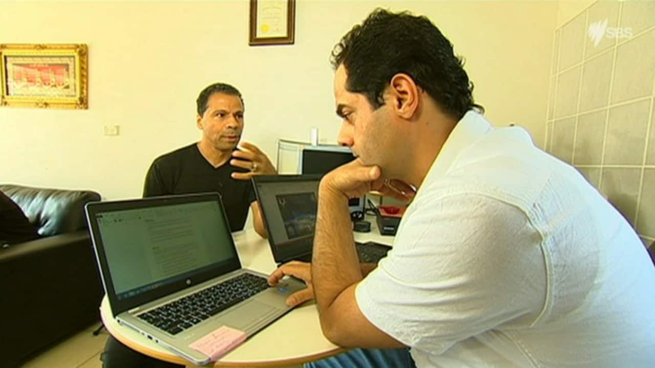 Refugee entrepreneur Mohamed Khatib (right) with Ben Benazzouzz from Settlement Services International. 