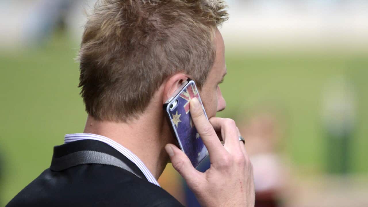 A man talks on his mobile phone in Brisbane