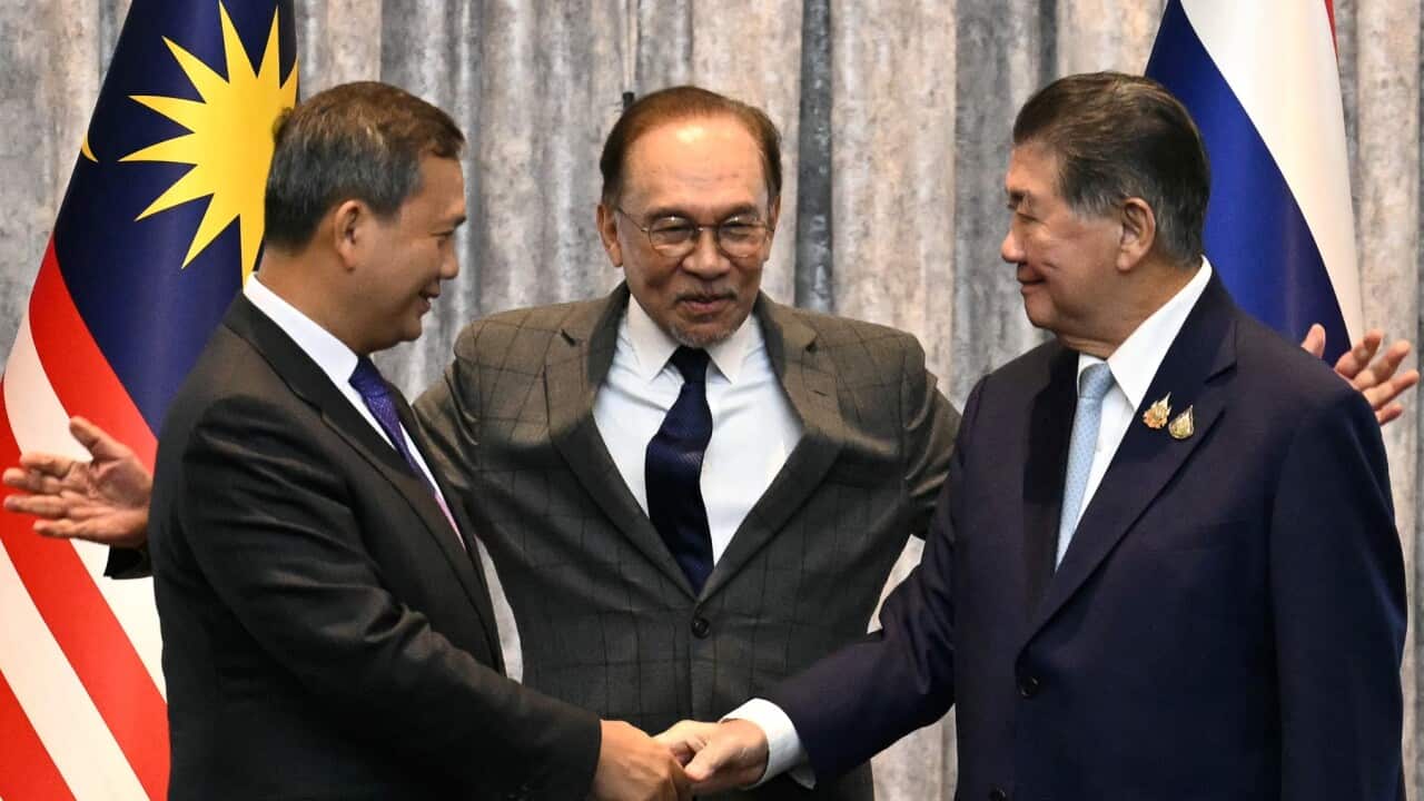 Cambodia's Prime Minister Hun Manet (L) and Thailand's acting Prime Minister Phumtham Wechayachai (R) with Malaysia's Prime Minister Anwar Ibrahim
