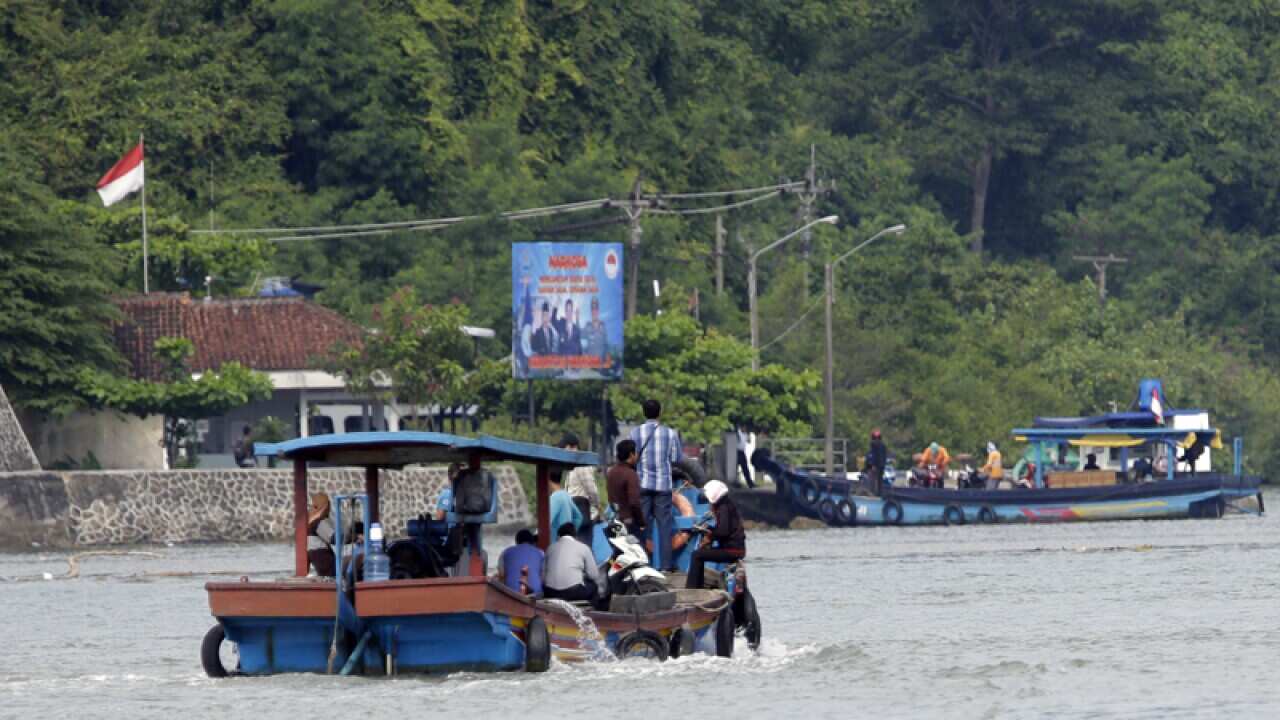 A boat transfers to Nusakambangan Island