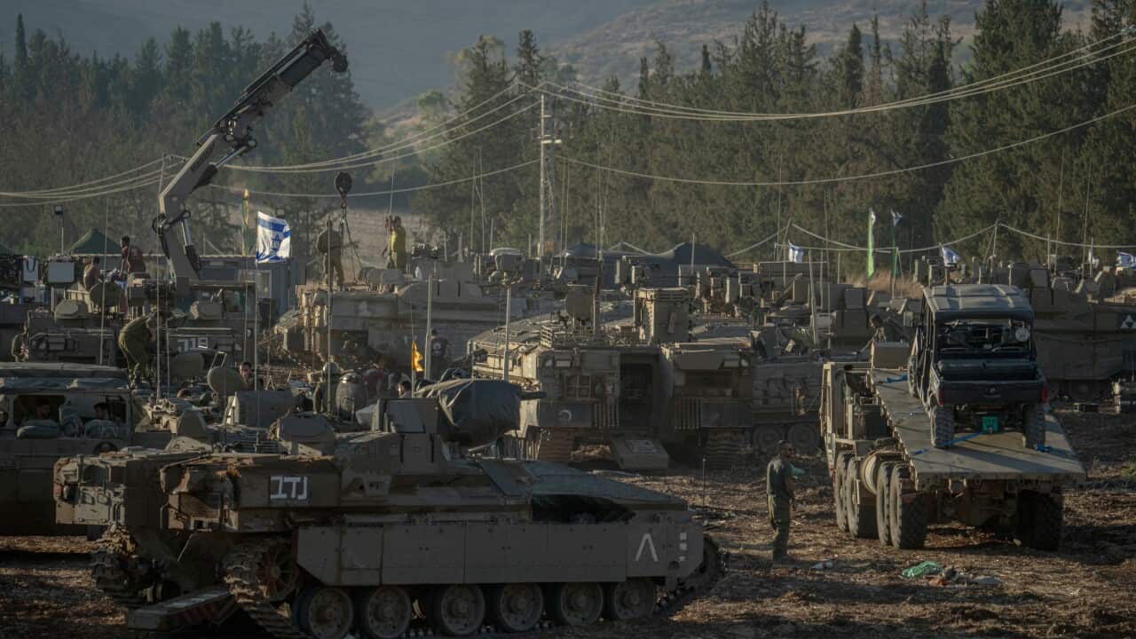 Israeli tanks deployed at the Lebanese border.