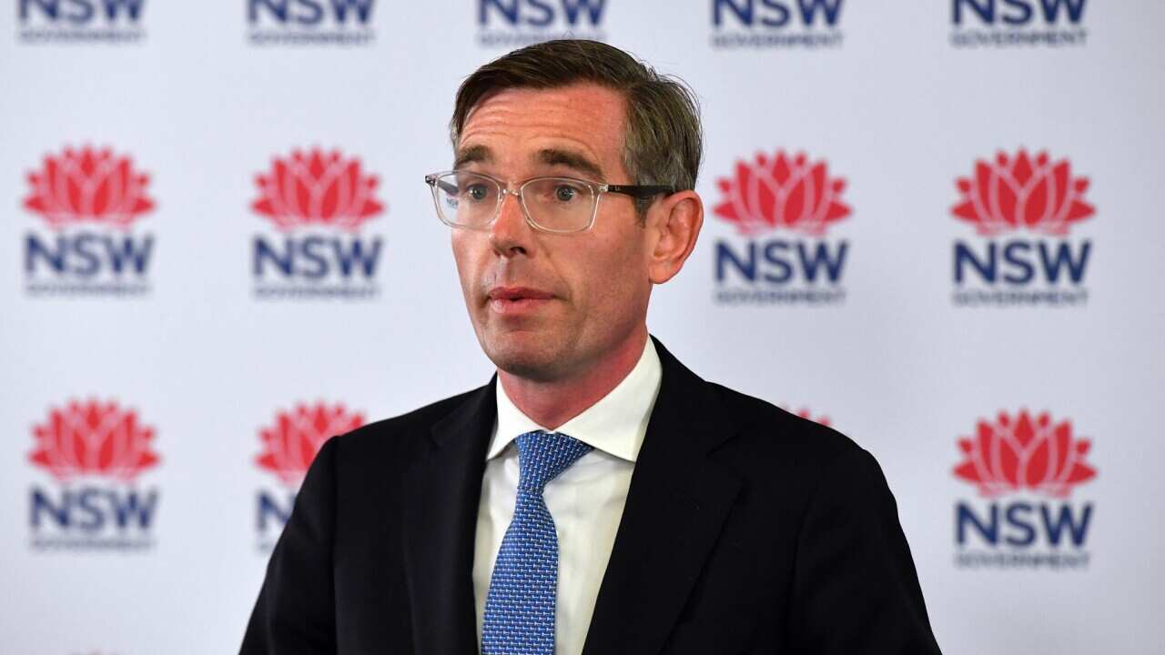 NSW Premier Dominic Perrottet speaks to the media