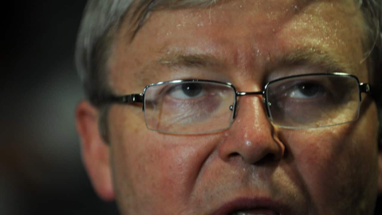 As polls slump, Rudd revs up campaign